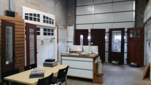A View Inside Aquarius Door Services’ Showroom Showcasing Different Products And Services 